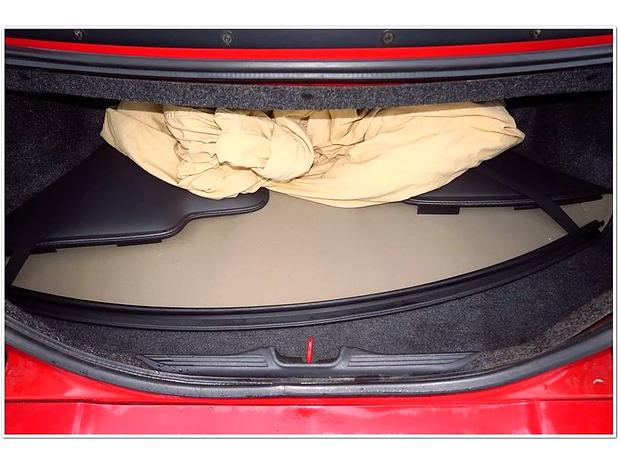 Trunk with top boot cover